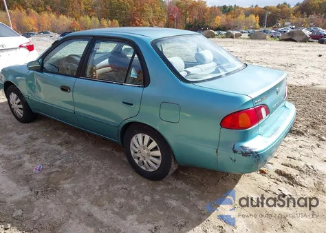 1999 Toyota Corolla Le z USA, uszkodzony, nr VIN 2T1BR12E2XC208457